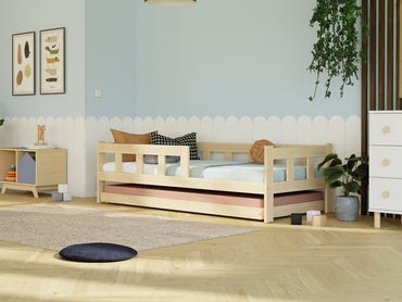 Children's bed with evolutionary fense drawer