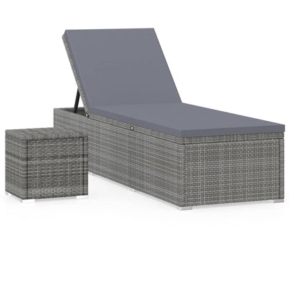 Silla larga con cojín y mesa de resina trenzada gris