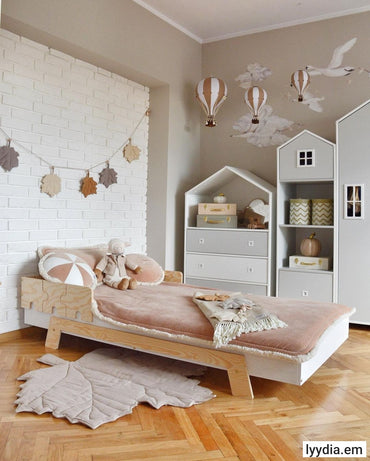 Children's bed with puzzle barriers