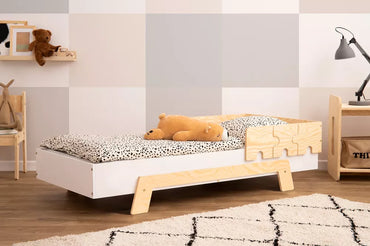 Cama infantil com barreiras de quebra -cabeça