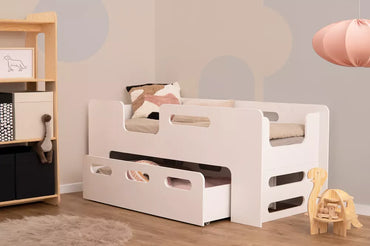 Children's bed with pee drawer