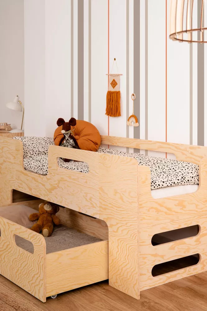 Children's bed with pee drawer