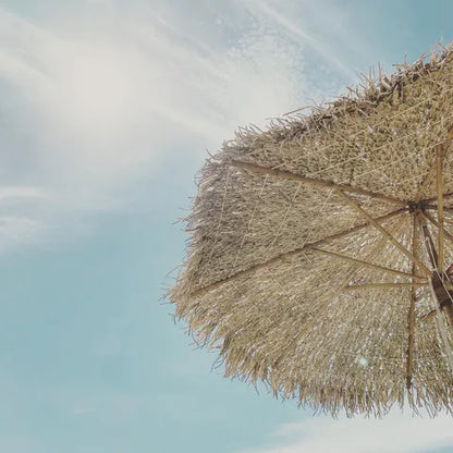 Bamboo parasol with banana leaf roof