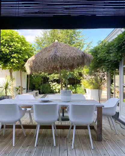 Bamboo parasol with banana leaf roof