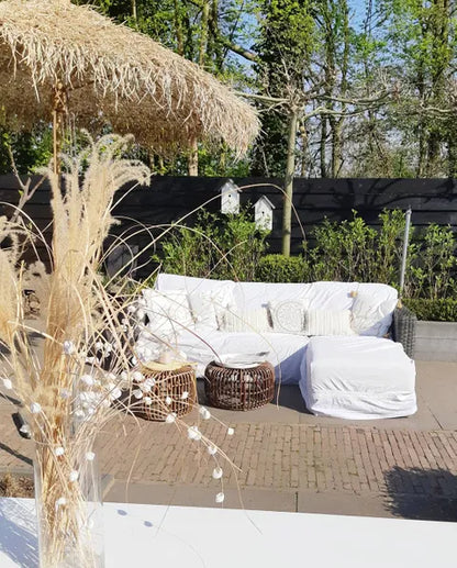 Bamboo parasol with banana leaf roof