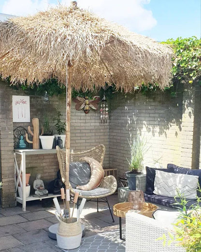 Bamboo parasol with banana leaf roof