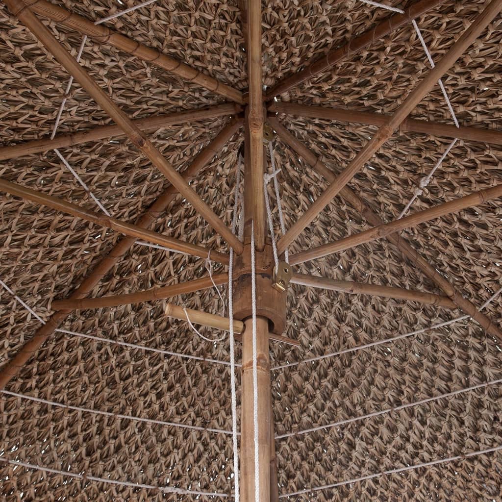 Bamboo parasol with banana leaf roof