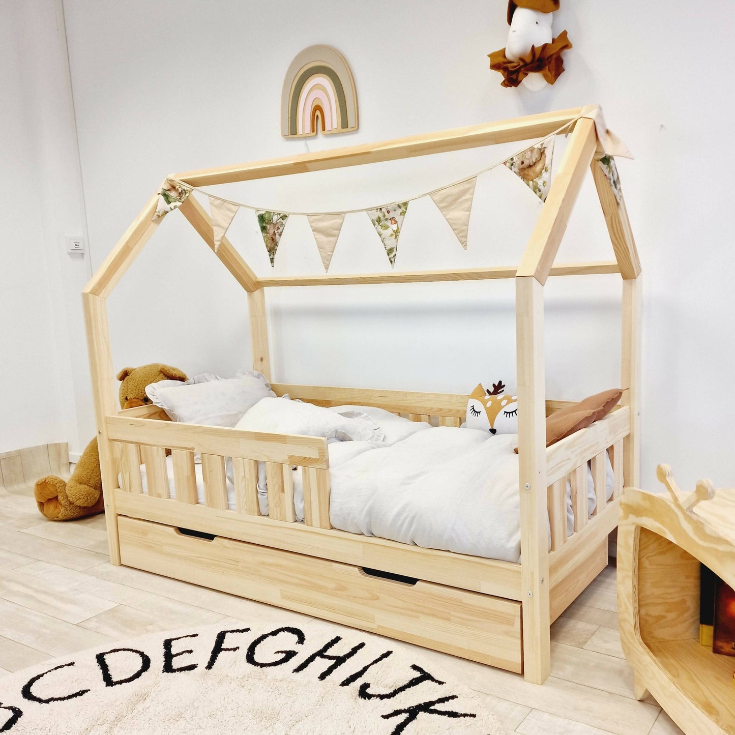 Children's cabin bed with bar barriers and drawer